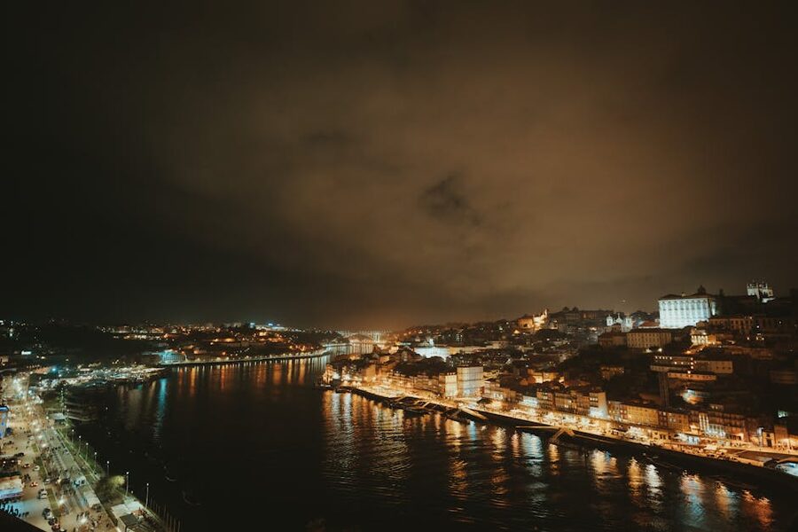 Porto evening skyline with illuminated riverbanks