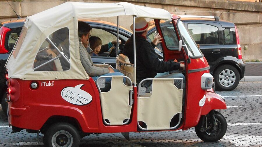 Tuk-tuk parked outside Sao Bento railway station Porto