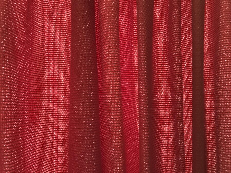 Red velvet theater curtain stage detail