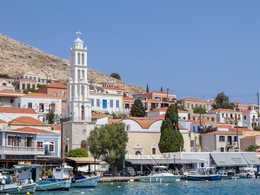 Symi Yialos harbour pastel houses Greece