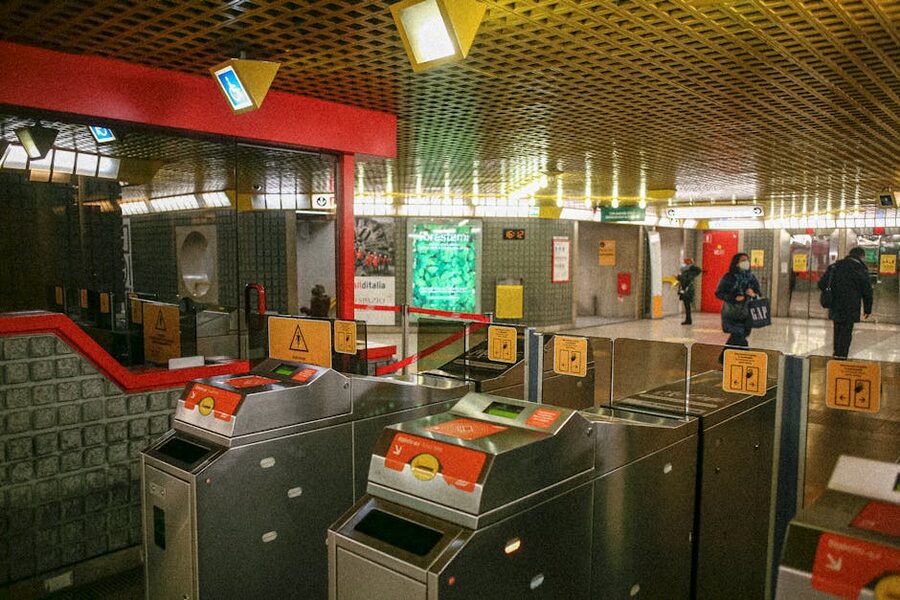 Subway ticket gates with passenger