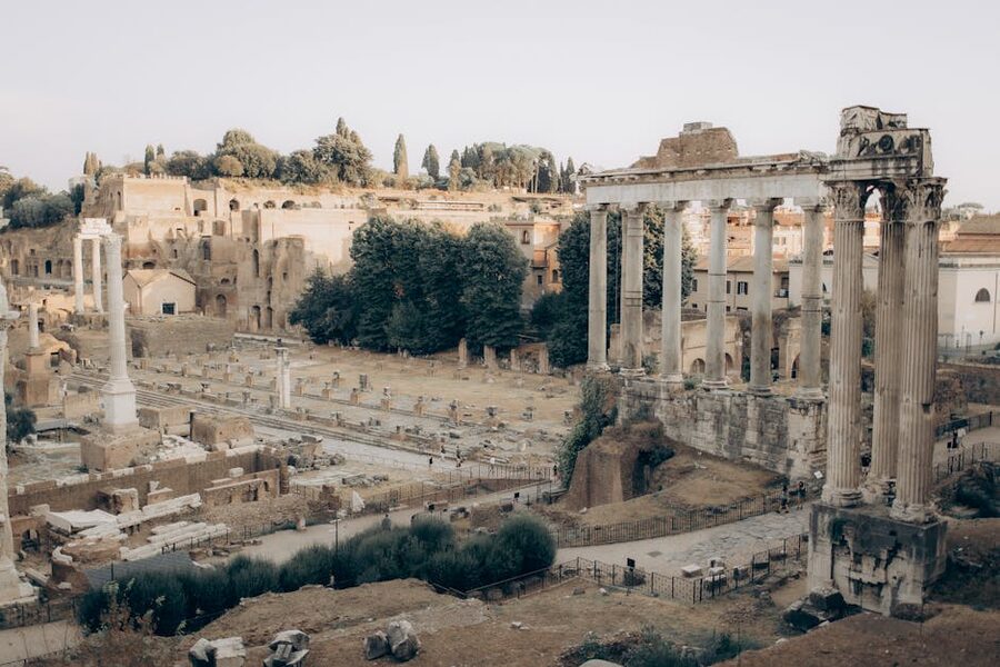 Roman Forum ruins in central Rome under a clear sky