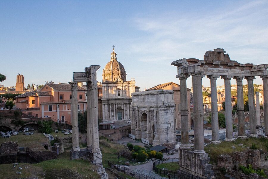 Roman Forum temple columns and ruins under sunlight