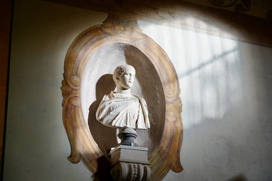 Marble bust in sunlight inside Borghese Gallery Rome
