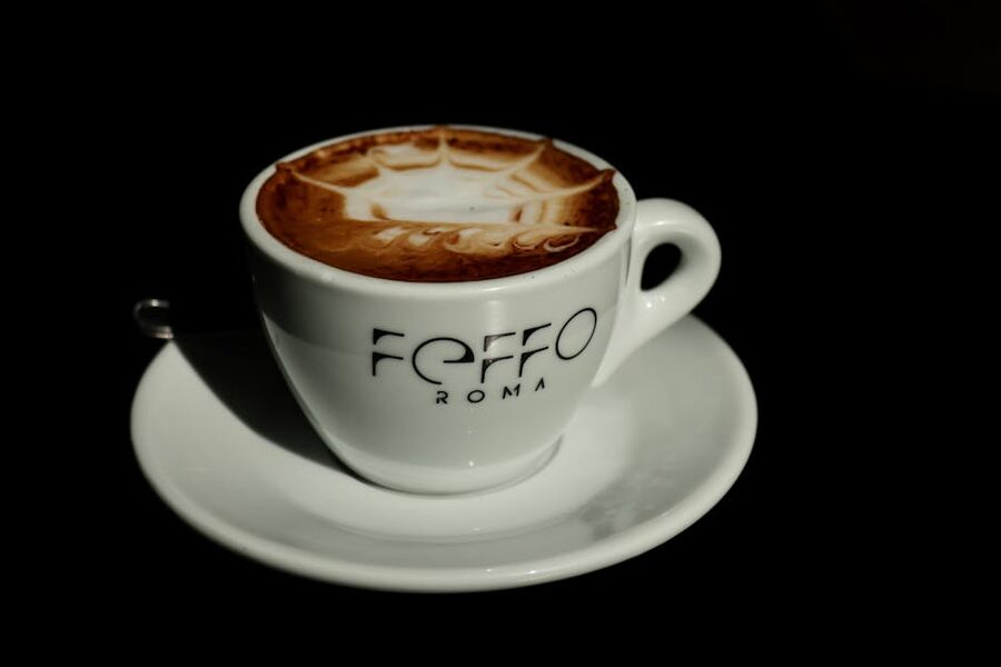 Italian cappuccino with latte art at a Rome cafe