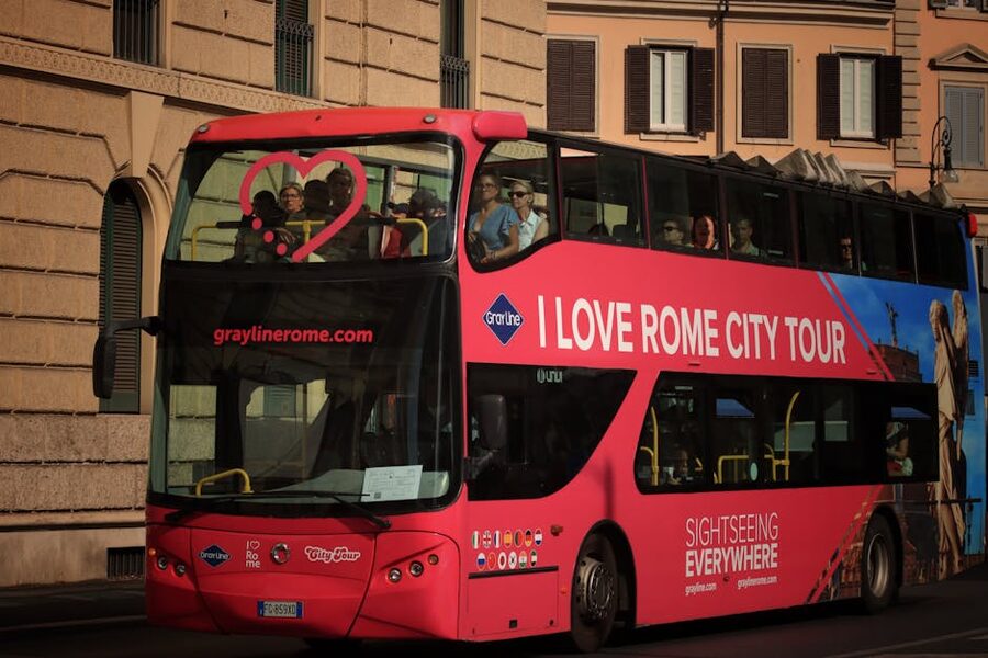 Rome hop-on hop-off double-decker tour bus with passengers