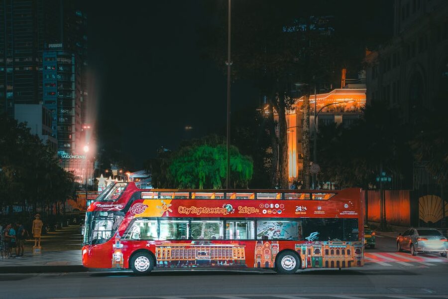 City sightseeing bus parked at night in Rome