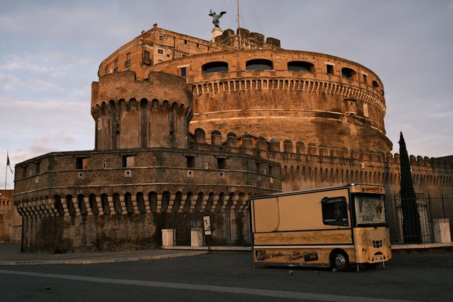 Castel Sant Angelo at sunrise with ice cream truck