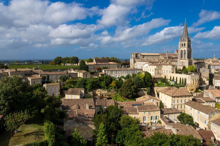 Saint-Emilion vineyard church village in the distance