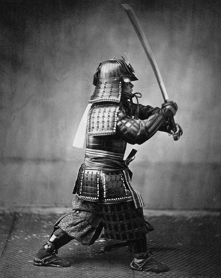 Historical photograph of a samurai with sword circa 1860