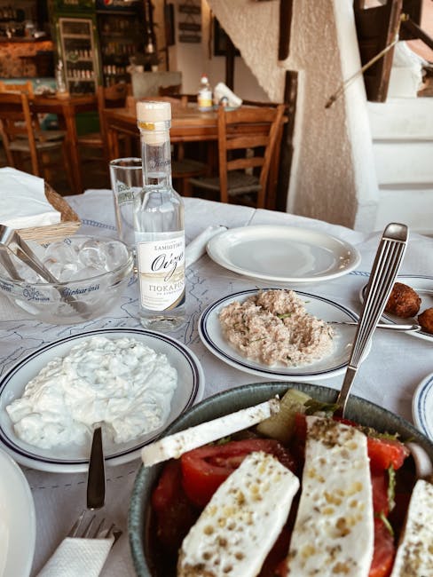 Greek meze spread tzatziki dolmades olives plate