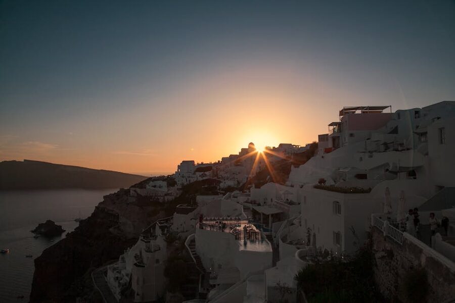 Oia sunset Santorini white architecture cliffs