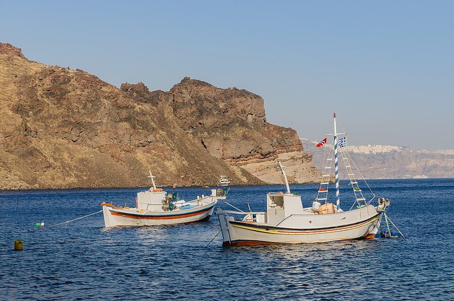 Thirassia Korfos village Santorini view across caldera