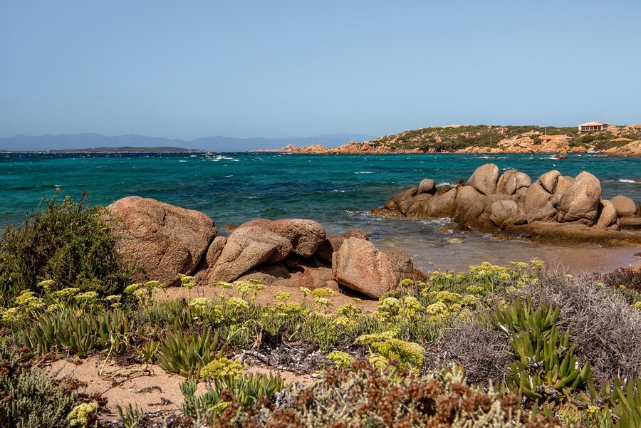Mediterranean cove at La Maddalena with cliffs and beach