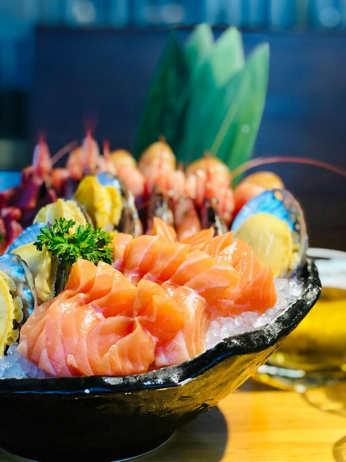 Traditional sashimi platter with fresh salmon and assorted seafood