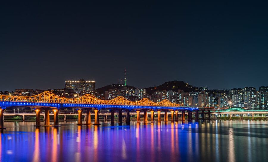 Seoul night skyline with illuminated bridge over Han River