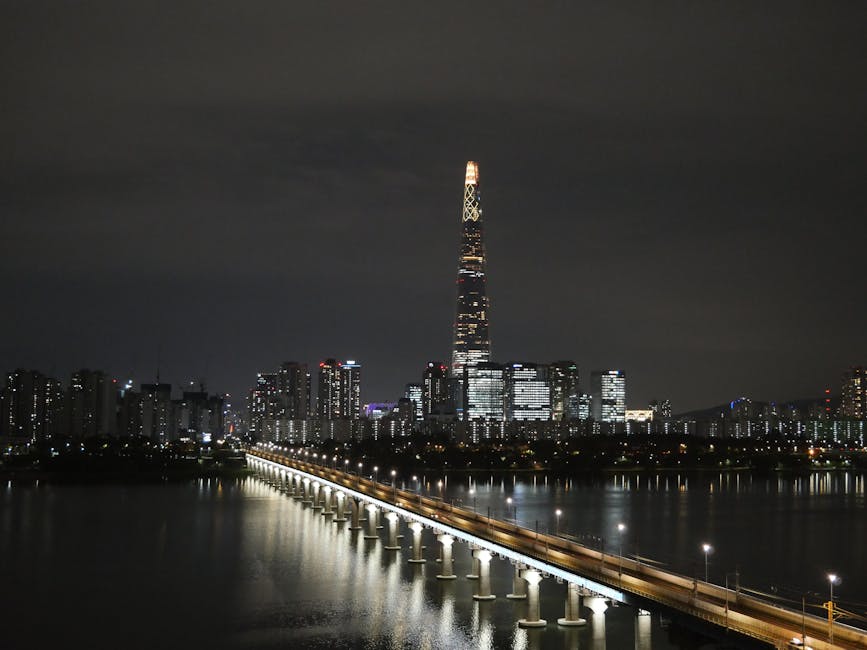 Seoul night skyline featuring Lotte World Tower over Han River