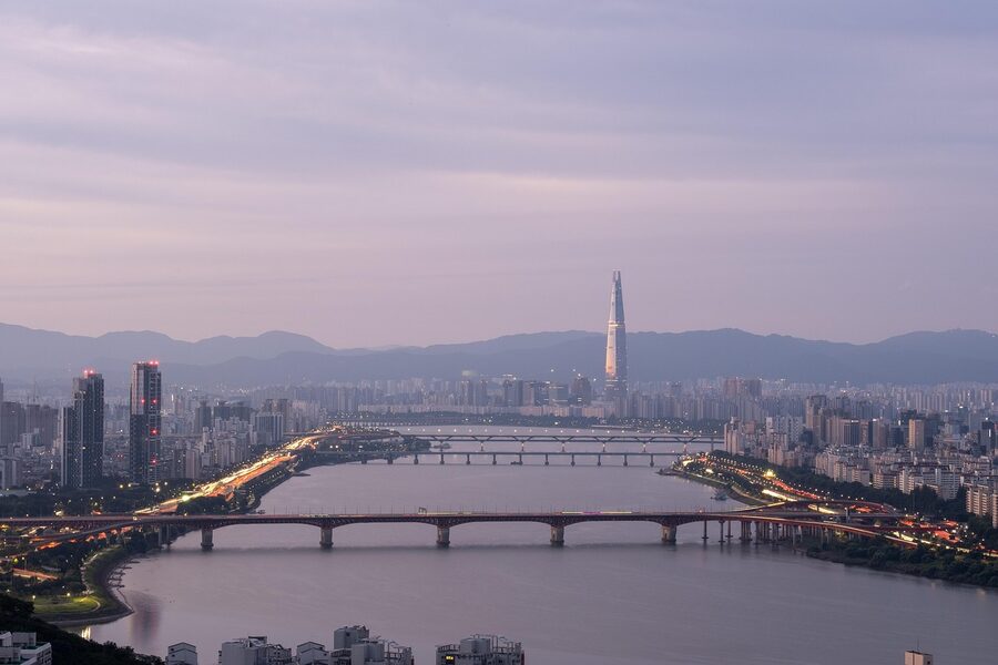 Seoul Han River skyline at sunrise with Lotte World Tower