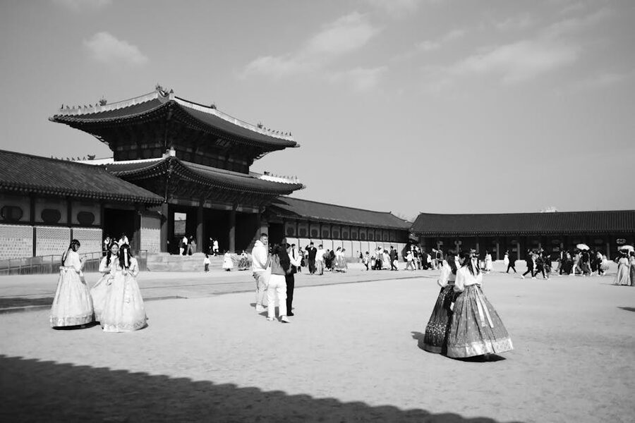 Traditional clothing near historic temple in Seoul
