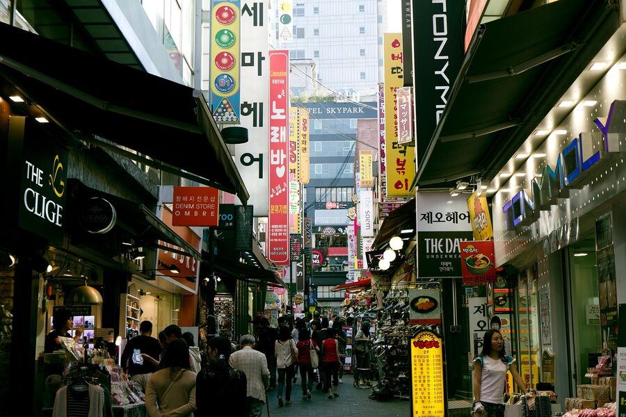 Namdaemun Market covered street in Seoul with stalls and shoppers