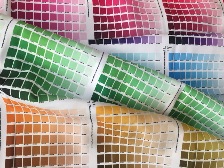 Coloured fabric swatches used during a personal color analysis drape test
