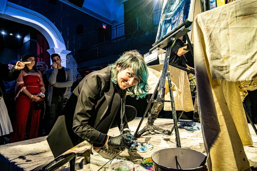 Live painter performing in front of an audience