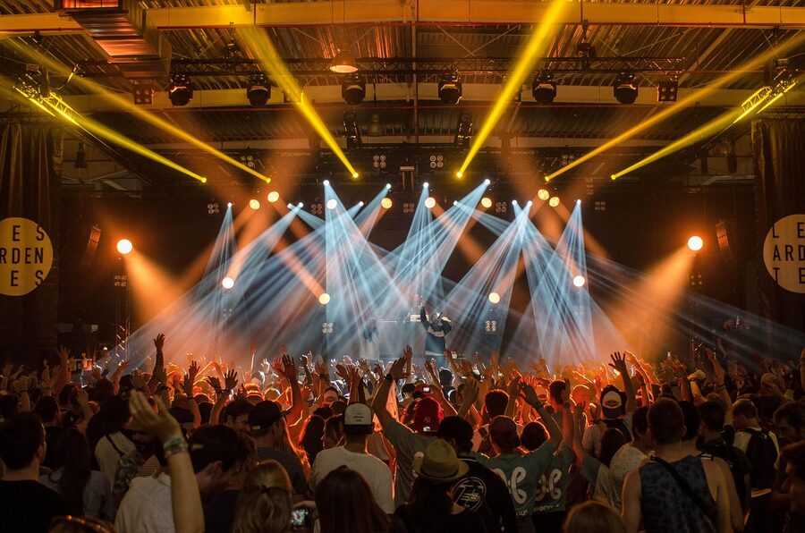K-pop style stage lights and crowd atmosphere