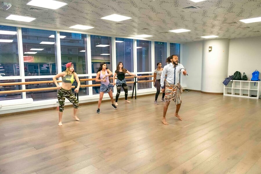 Instructor leading a dance class group Seoul