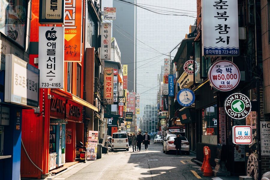 Seoul nightlife bar street with signs for Korean restaurants
