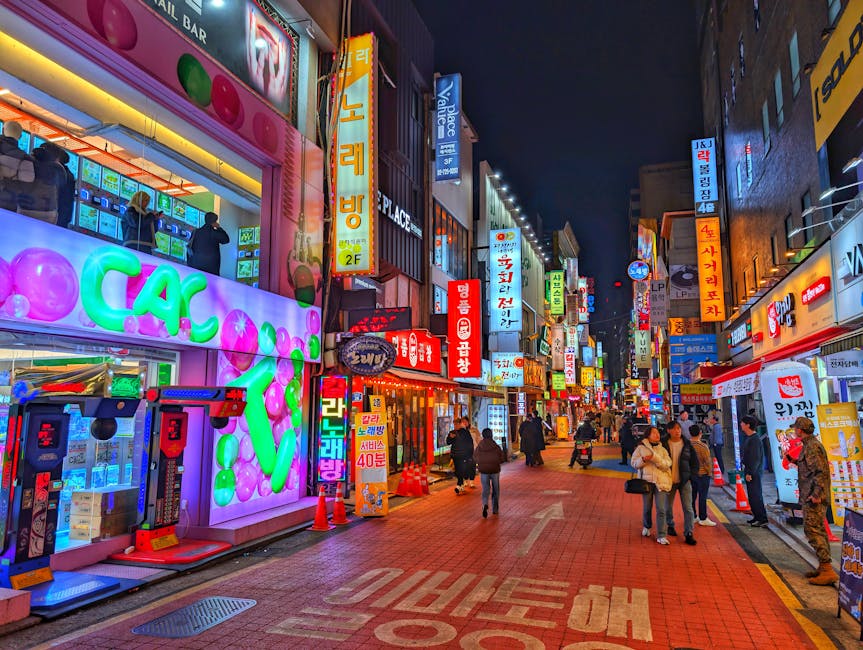 Seoul nightlife street with neon signs and pedestrians