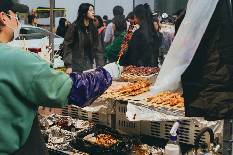Seoul street food market with stalls and visitors