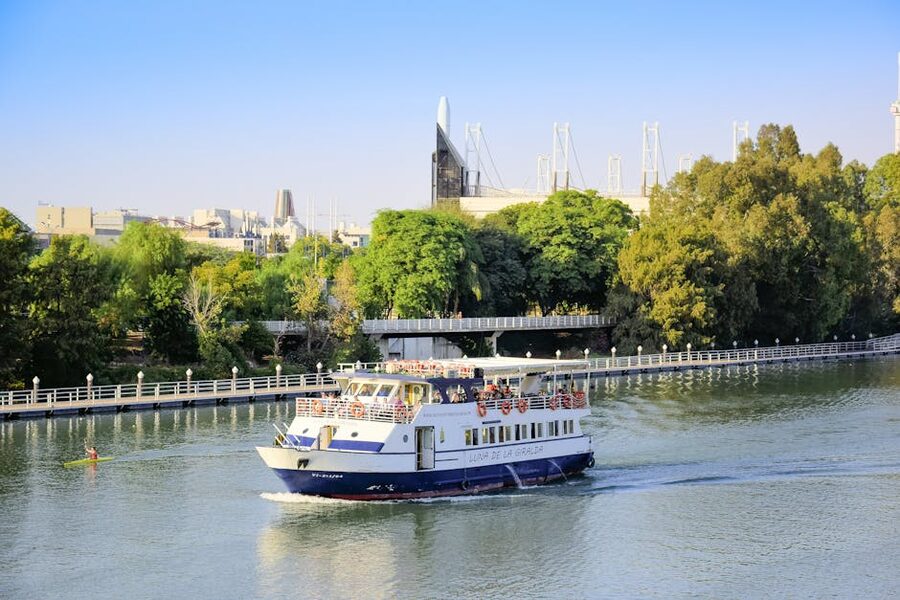 Cruise boat sailing on the Guadalquivir River Seville