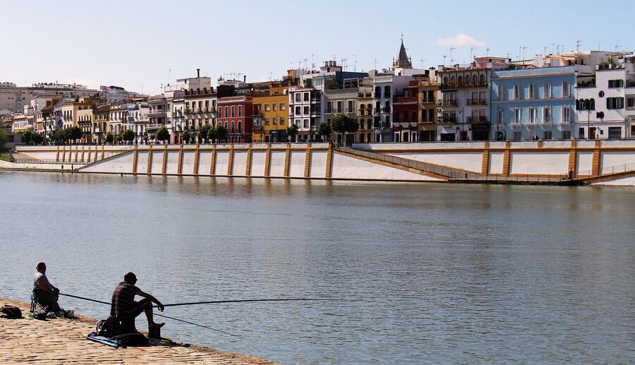 Calle Betis colourful houses on the Triana riverfront Seville