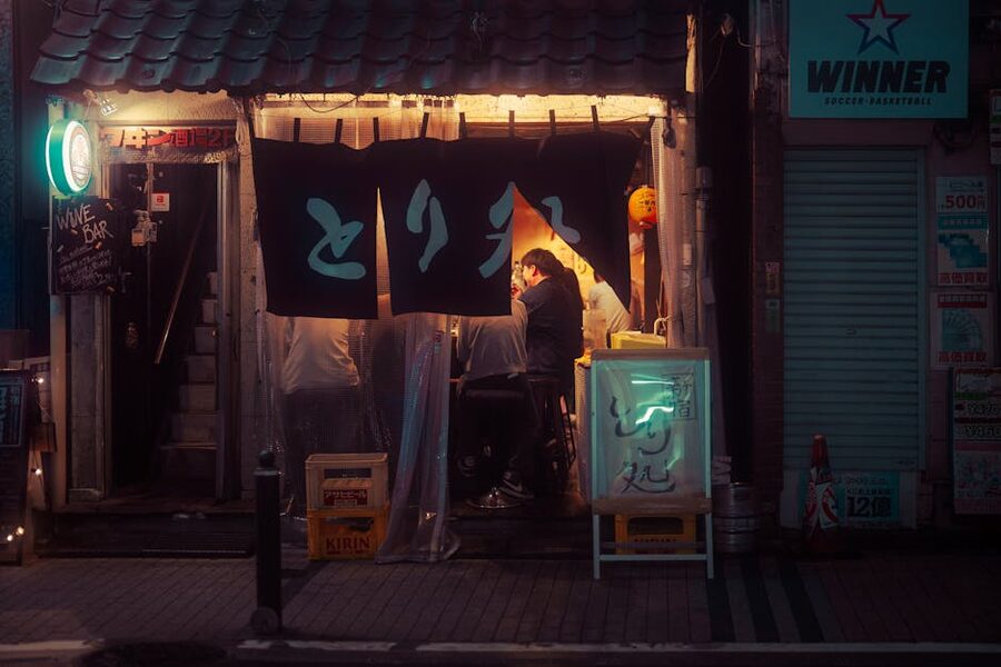 Cozy interior of a Tokyo izakaya at night