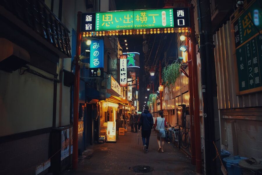 People in Omoide Yokocho alley in Shinjuku at night