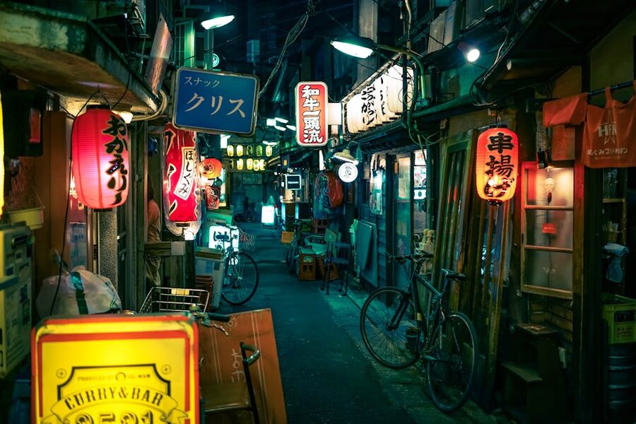 Tokyo alley with colorful lanterns at night