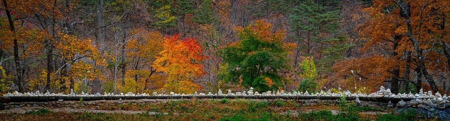 Sinheungsa Temple framed by autumn maple leaves