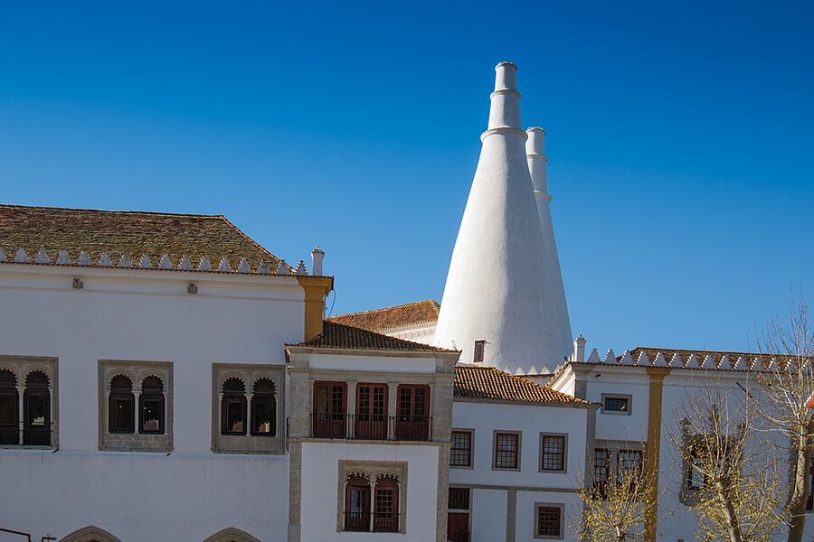 Sintra National Palace conical chimneys white building old village