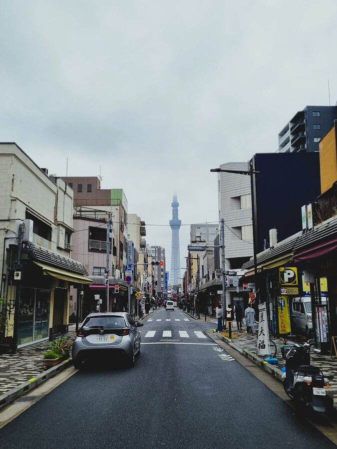 Downtown Tokyo street view featuring the iconic Skytree tower