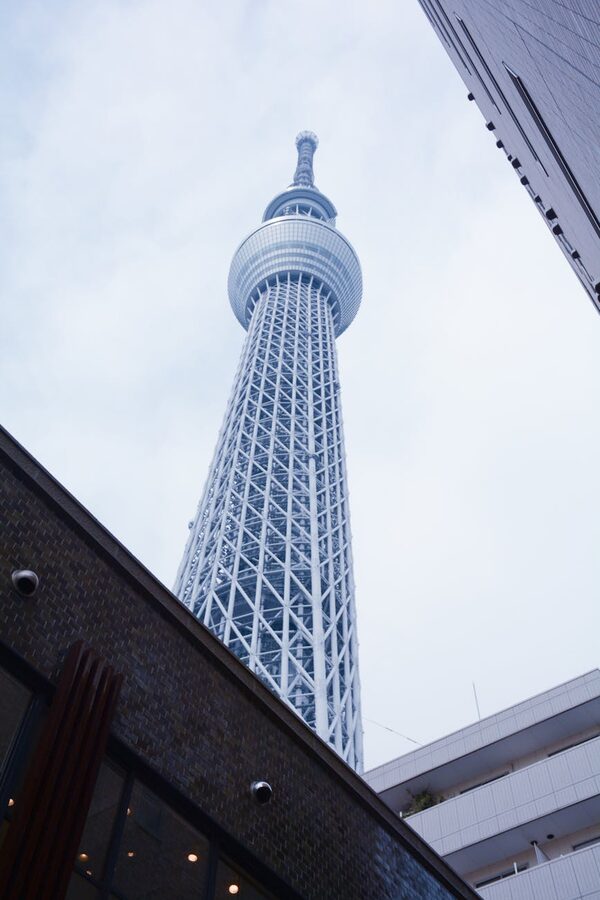 Low-angle view of Tokyo Skytree Tower in Sumida City against sky