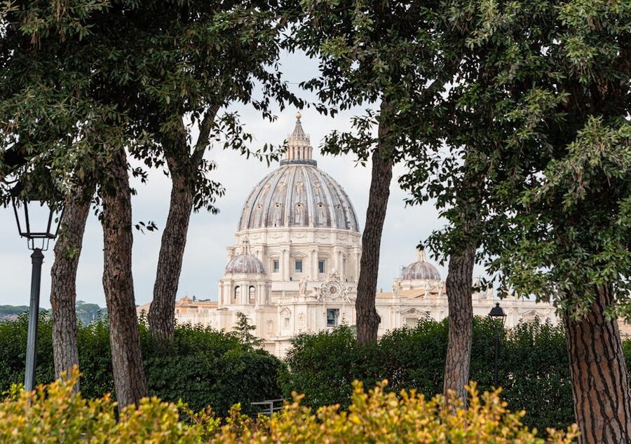 St Peters Basilica framed by trees in Rome