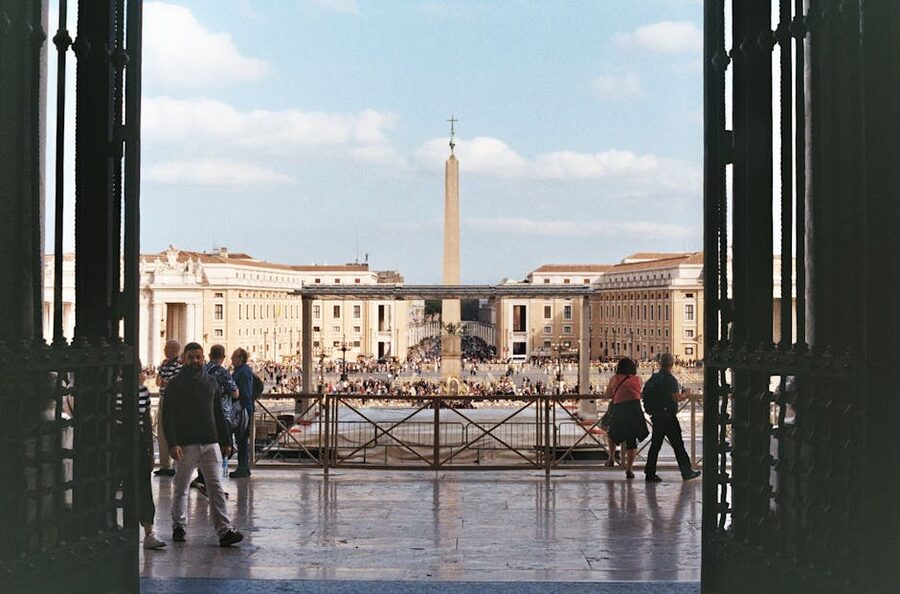 Crowds gathered at St Peter's Square around the central obelisk