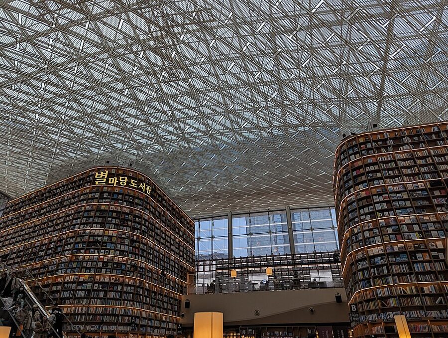Starfield Library towering bookshelves with visitors