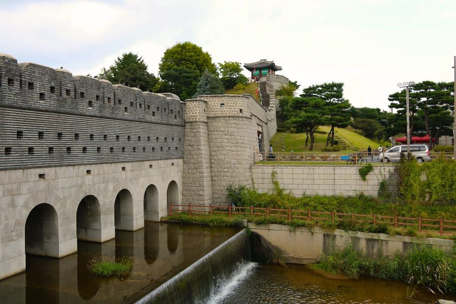 Suwon fortress stone wall with vegetation