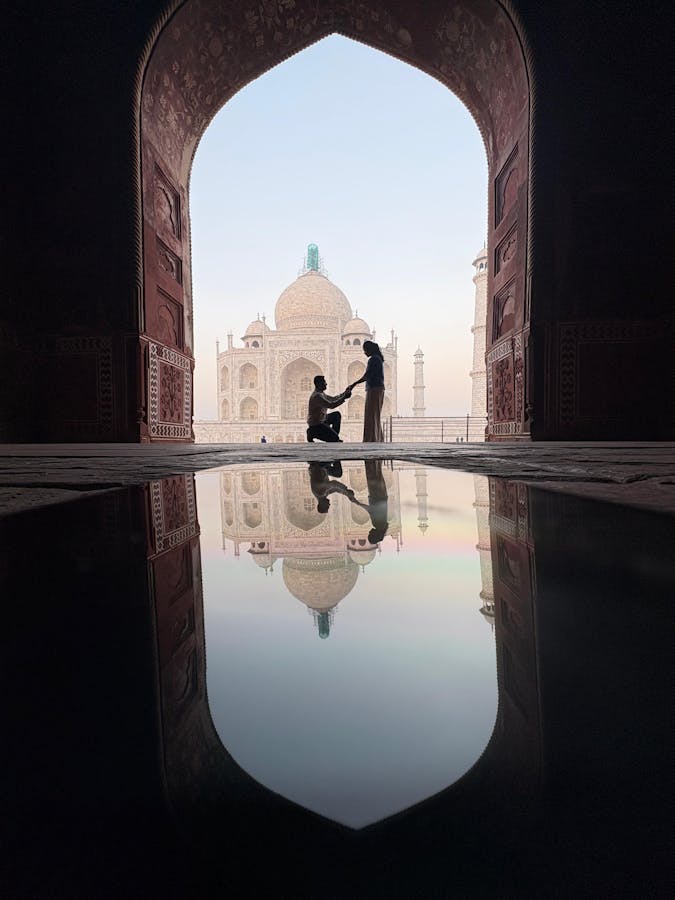 Taj Mahal with long shadows and dramatic evening sky