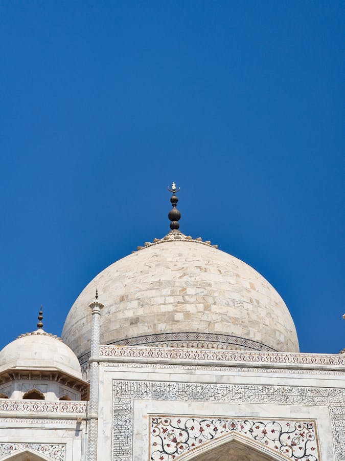 Taj Mahal reflected in the still water of the central pool