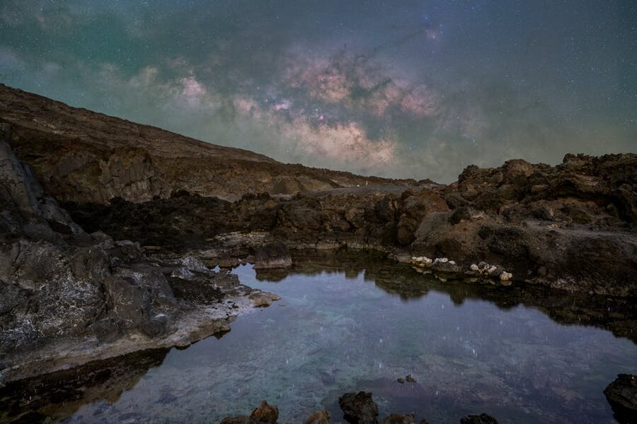 Milky Way arching over Teide rocky landscape
