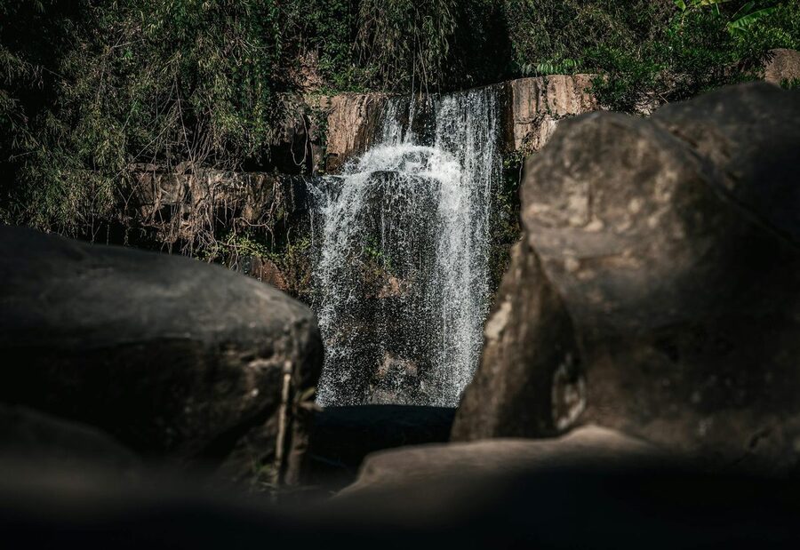 Serene waterfall in a lush Thai forest