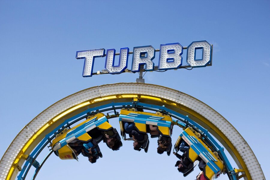 People enjoying theme park ride