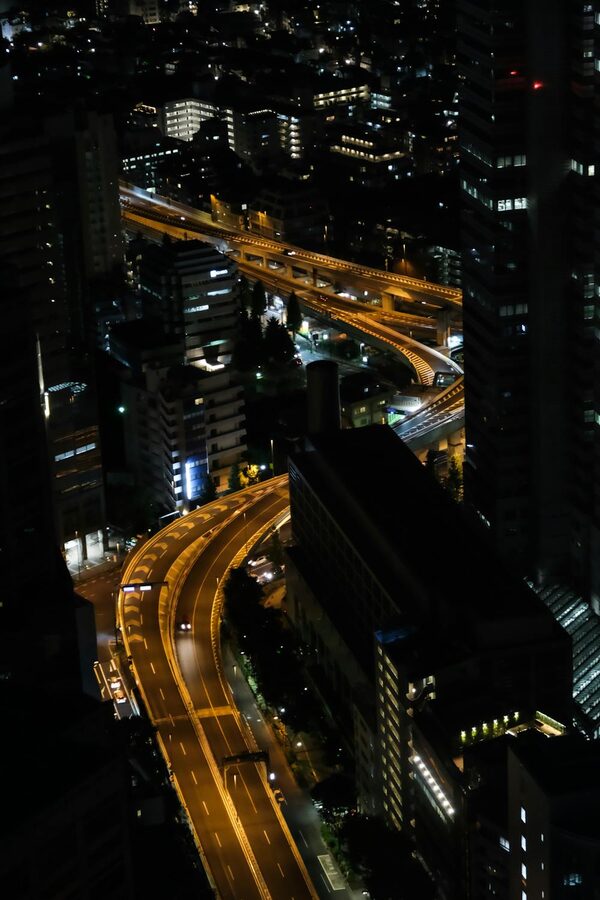Aerial view of illuminated Tokyo highways and buildings at night